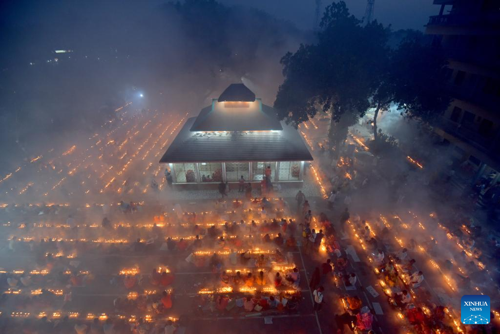 Bangladeshi devotees sit for prayer during religious fasting festival