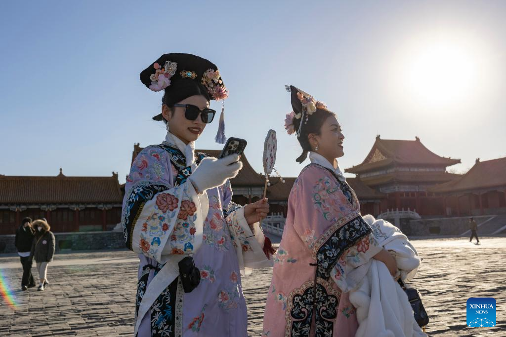 Tourists visit Palace Museum in Beijing