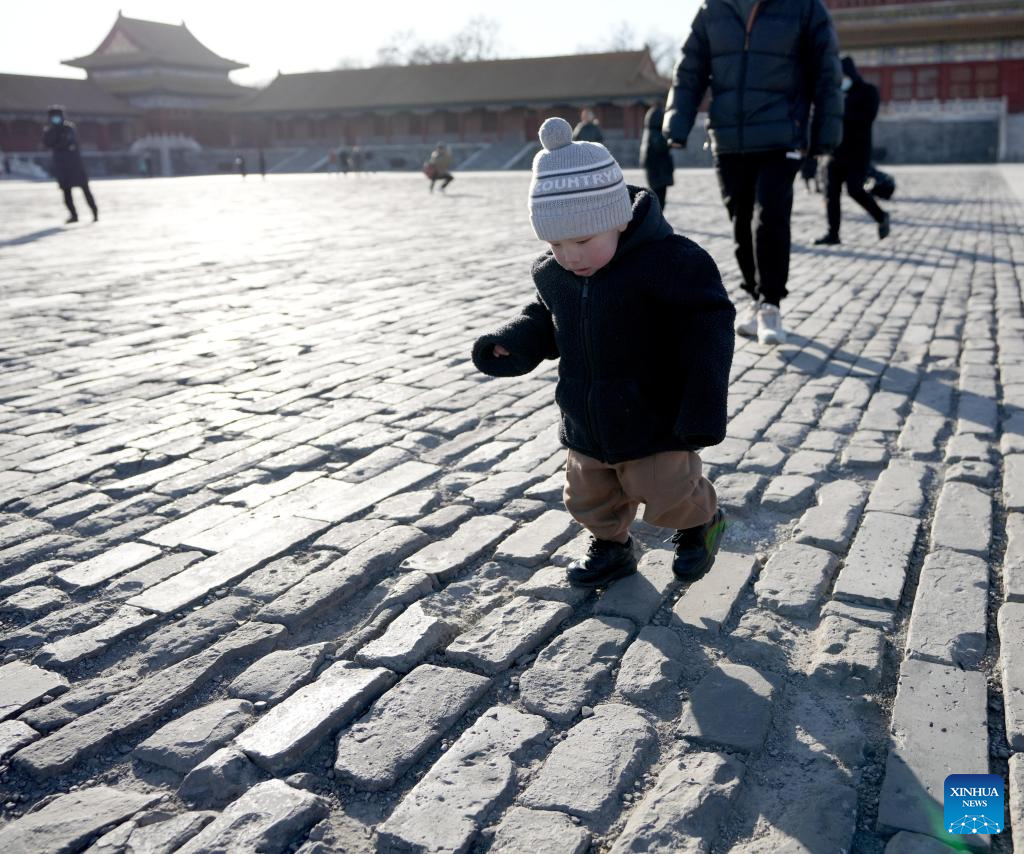 Tourists visit Palace Museum in Beijing
