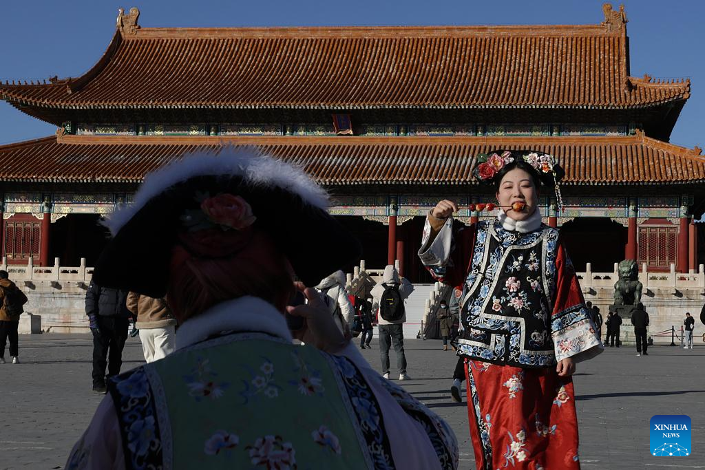 Tourists visit Palace Museum in Beijing
