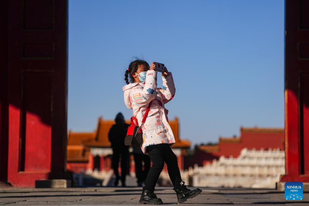 Tourists visit Palace Museum in Beijing