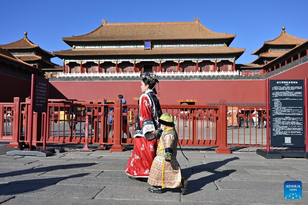 Tourists visit Palace Museum in Beijing