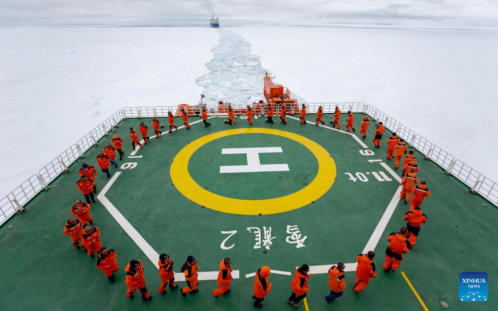 China's research icebreaker Xuelong 2 sails through ice floes