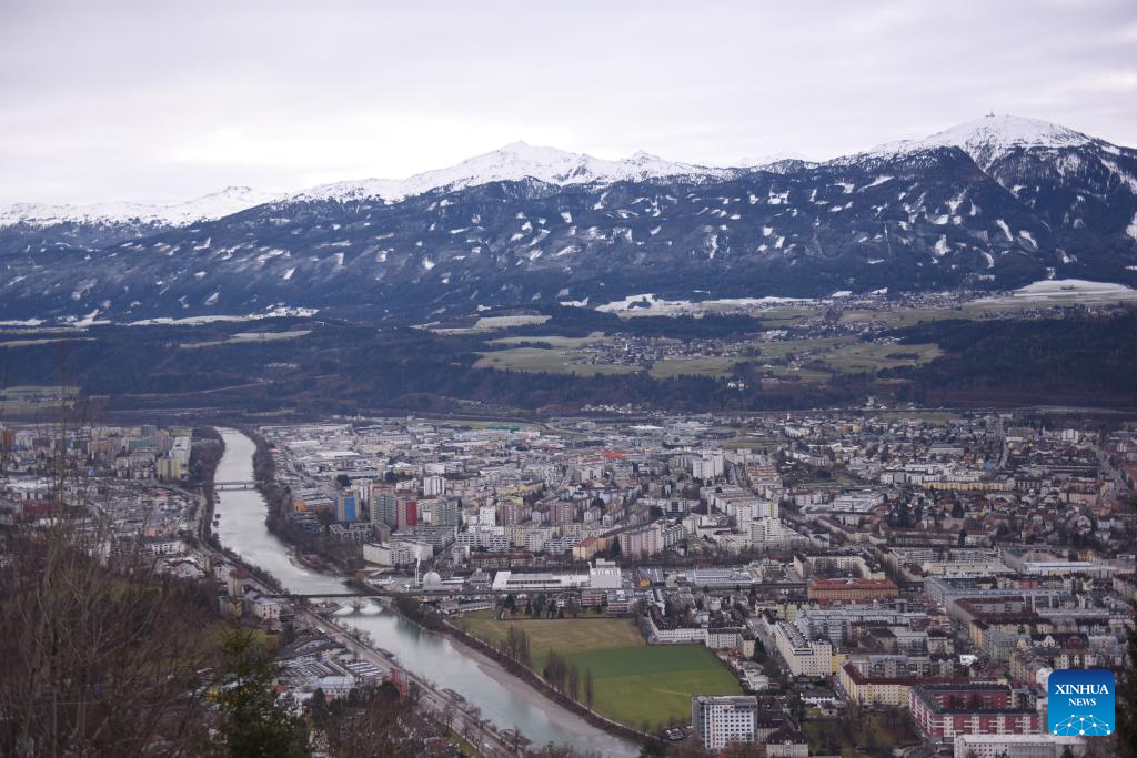View of Innsbruck city, snow mountains in Austria