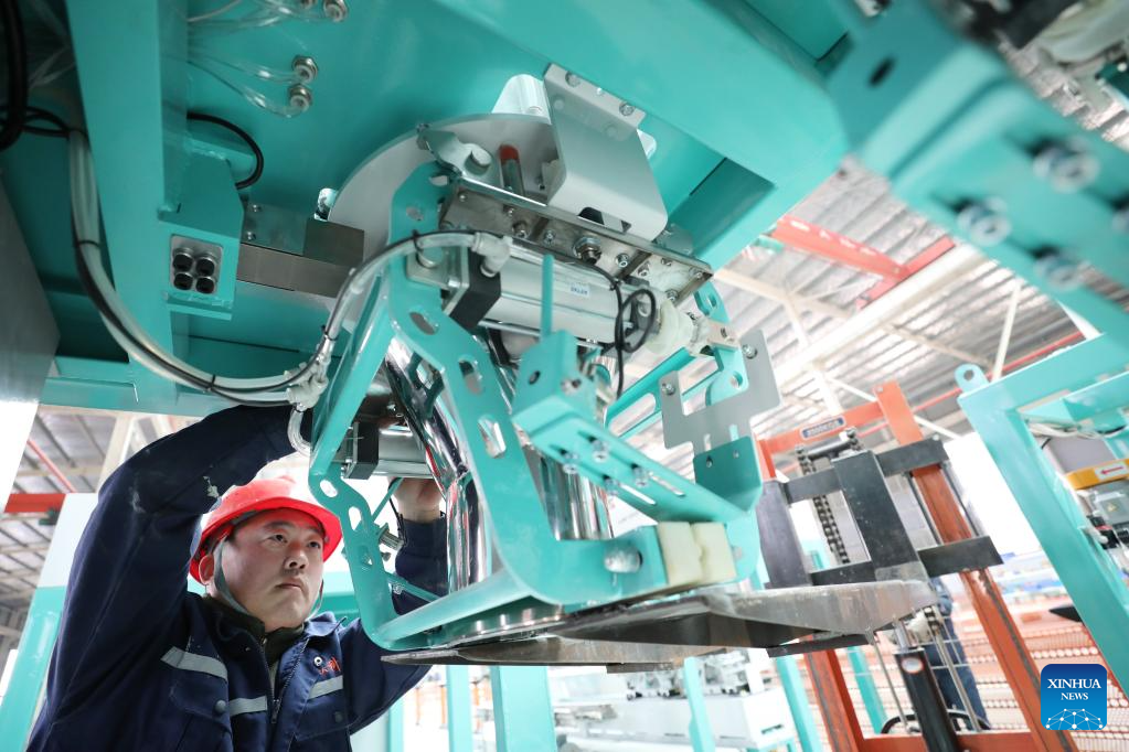 Enterprises across China ratchet up production in new year