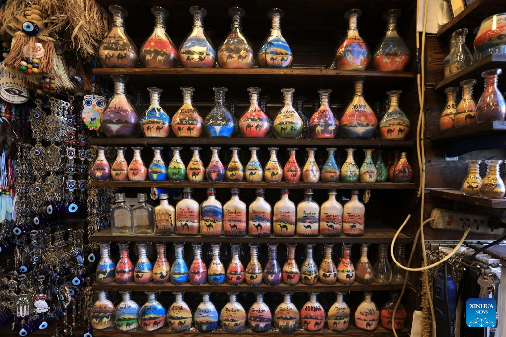 In pics: sand bottle art in Amman, Jordan