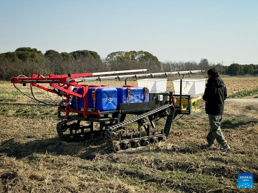 Futuristic scene of robots taking over backbreaking farm jobs on horizon