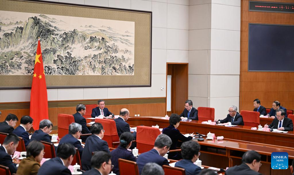 China's State Council discusses draft government work report