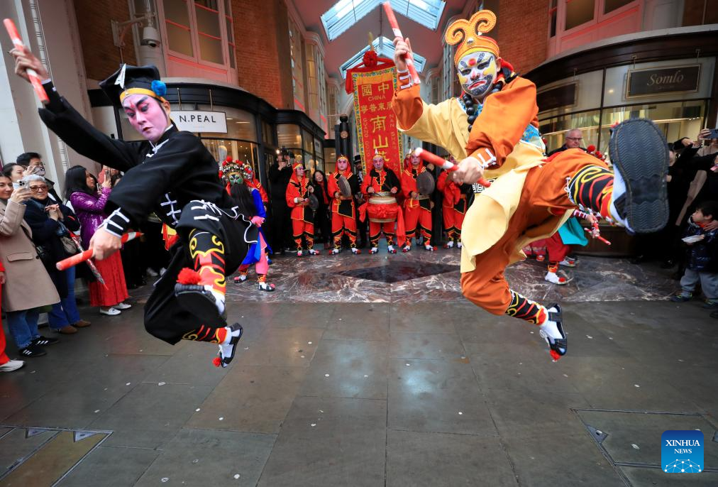 Artists perform Yingge Dance at Burlington Arcade in London