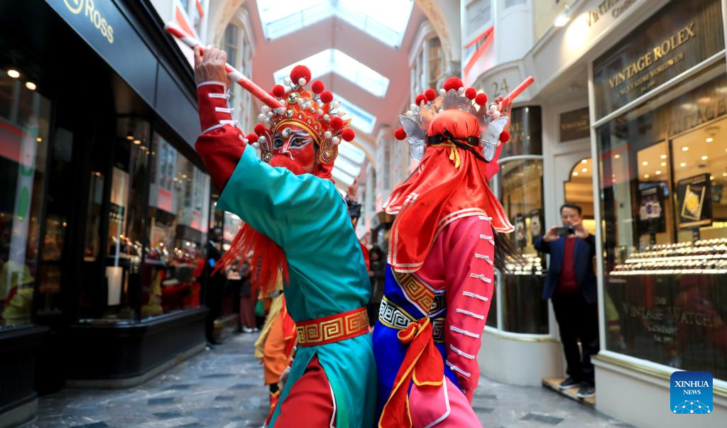 Artists perform Yingge Dance at Burlington Arcade in London