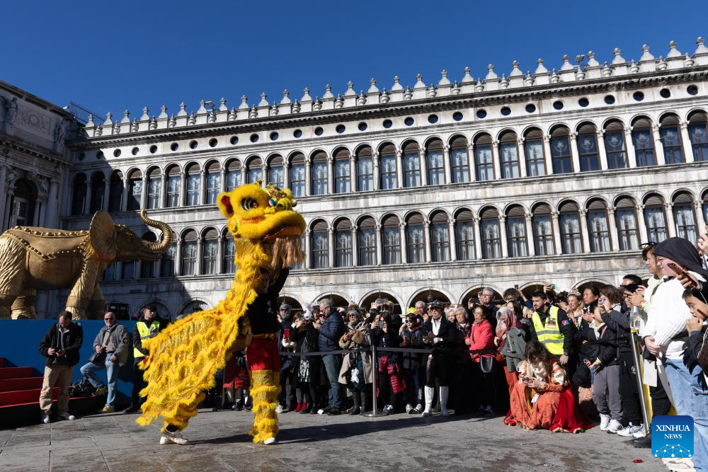 Chinese costume show held at Piazza San Marco in Venice