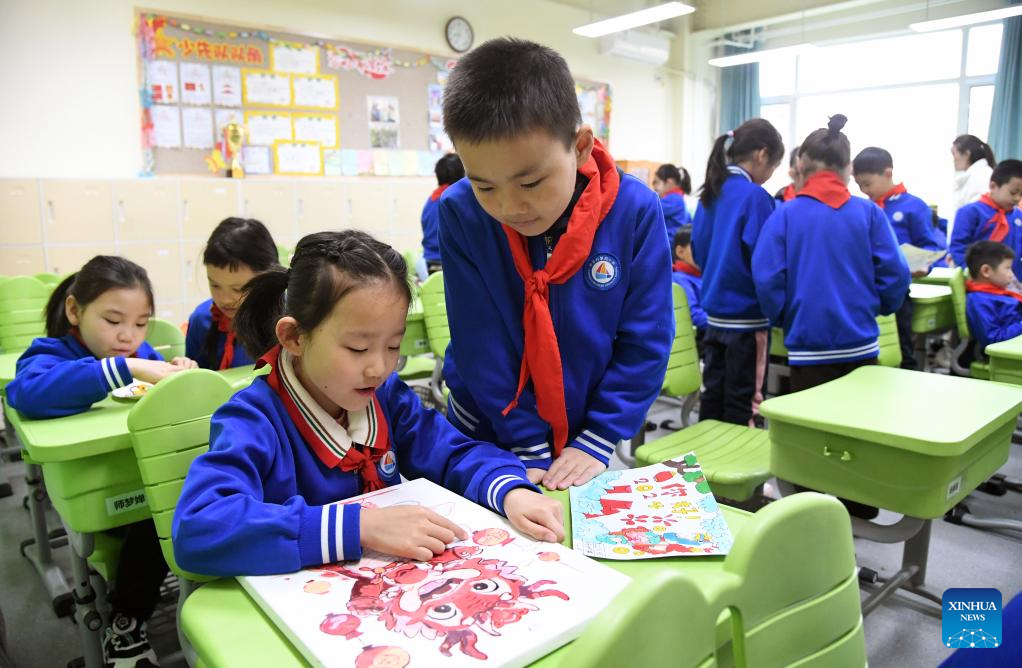 New semester for primary and secondary schools kicks off across China
