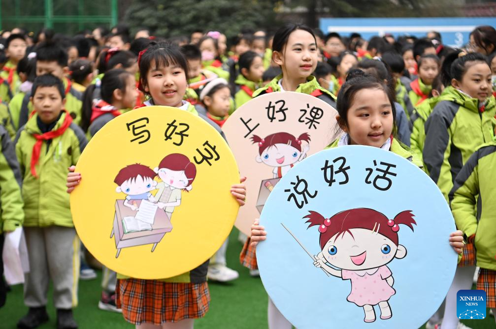 New semester for primary and secondary schools kicks off across China