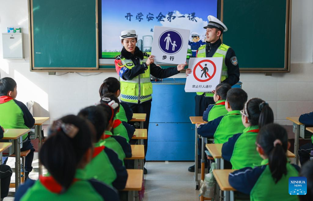 New semester for primary and secondary schools kicks off across China