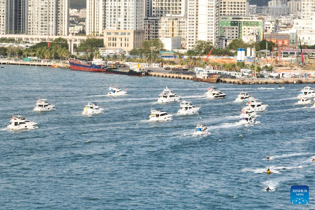 Yachts ride waves in Sanya, China's Hainan
