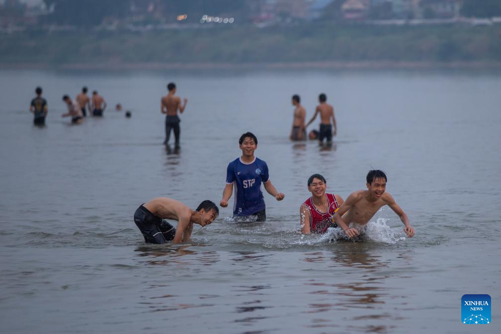 People enjoy leisure time in Vientiane, Laos