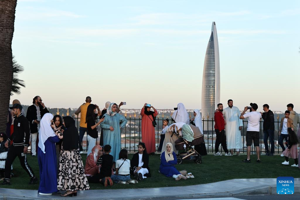 People enjoy themselves during Eid al-Fitr holiday across world