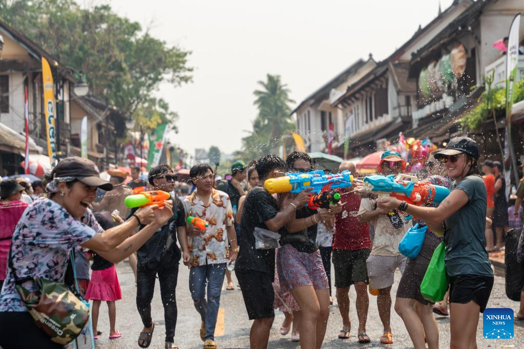 People celebrate Songkran Festival in Laos