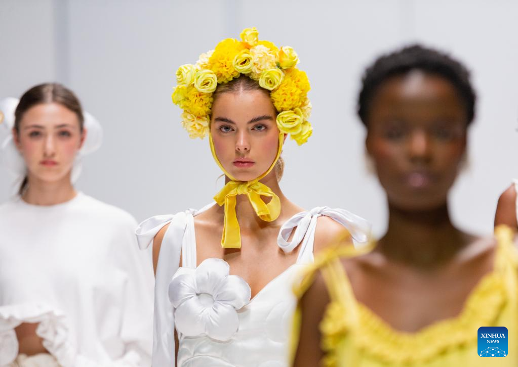 Models present creations during South African Fashion Week in Johannesburg