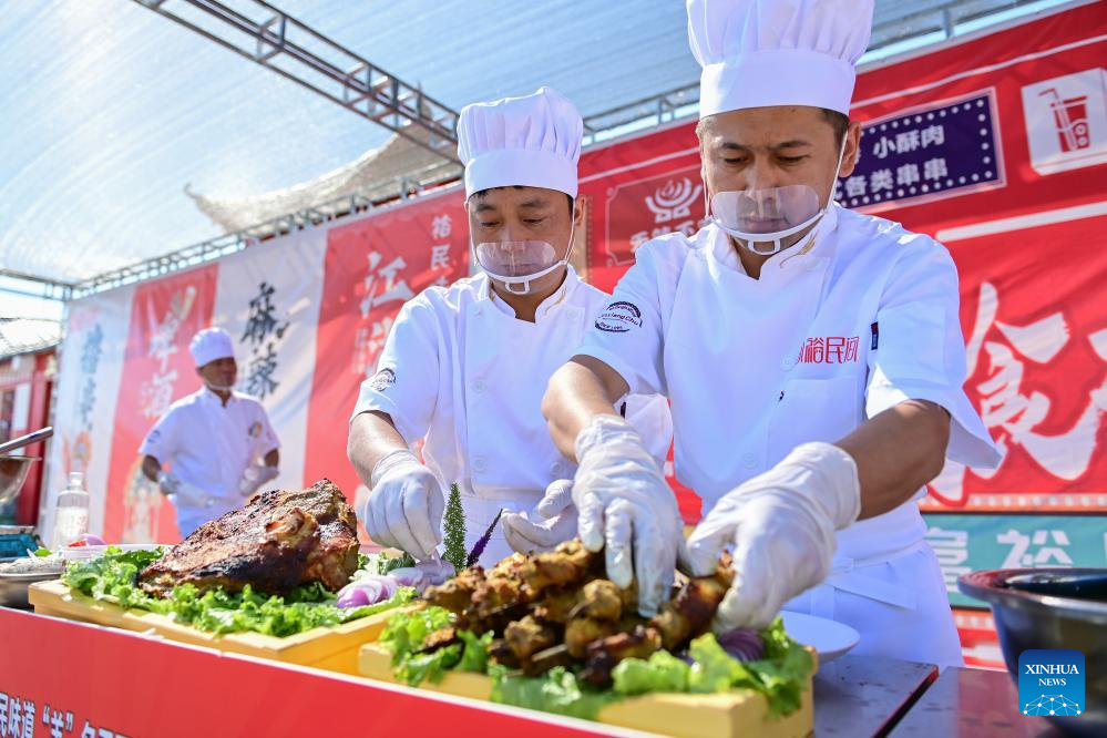 Lamb cooking contest held in Yumin County, China's Xinjiang