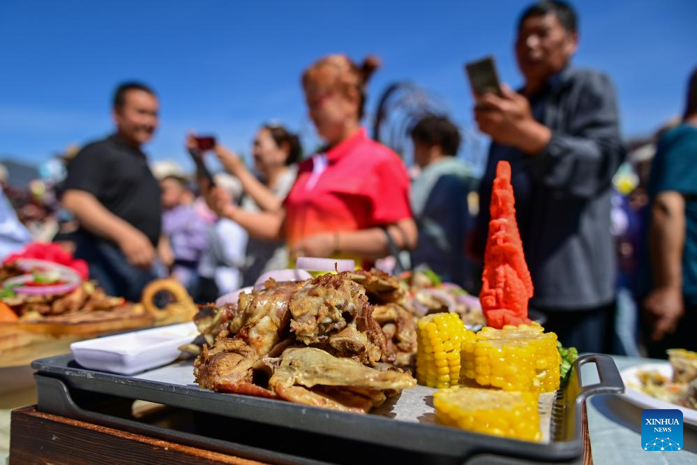 Lamb cooking contest held in Yumin County, China's Xinjiang