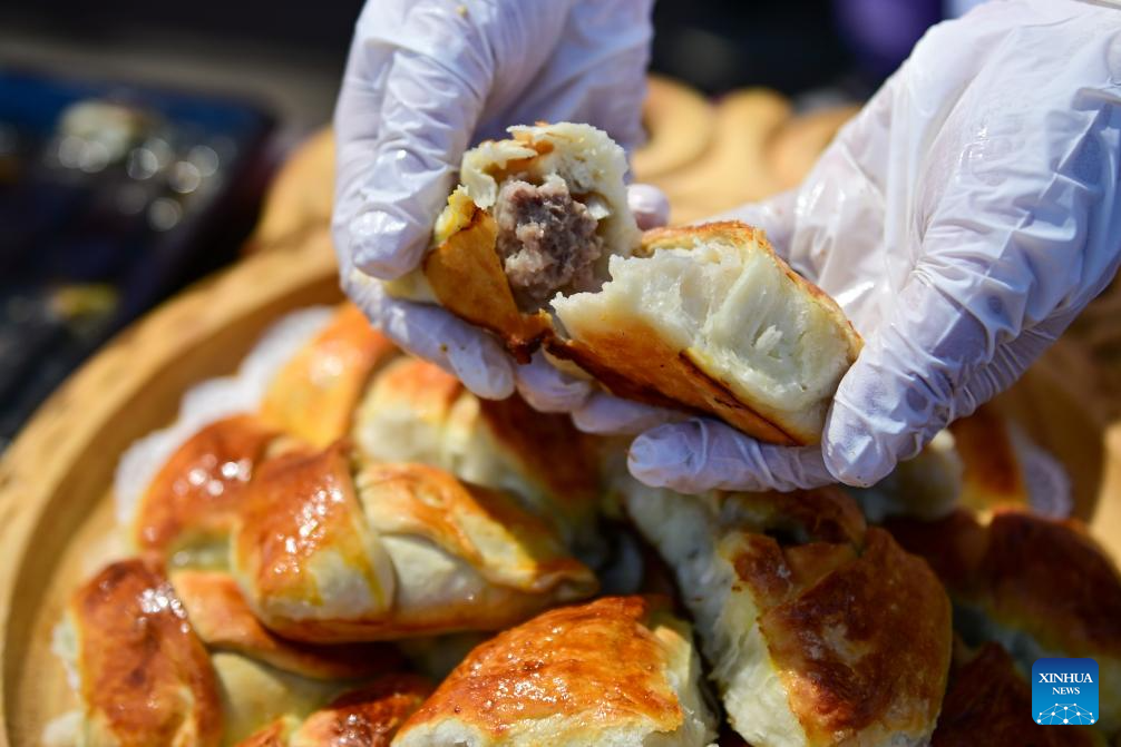 Lamb cooking contest held in Yumin County, China's Xinjiang