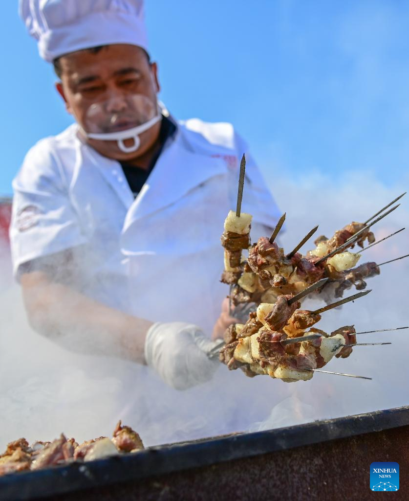 Lamb cooking contest held in Yumin County, China's Xinjiang