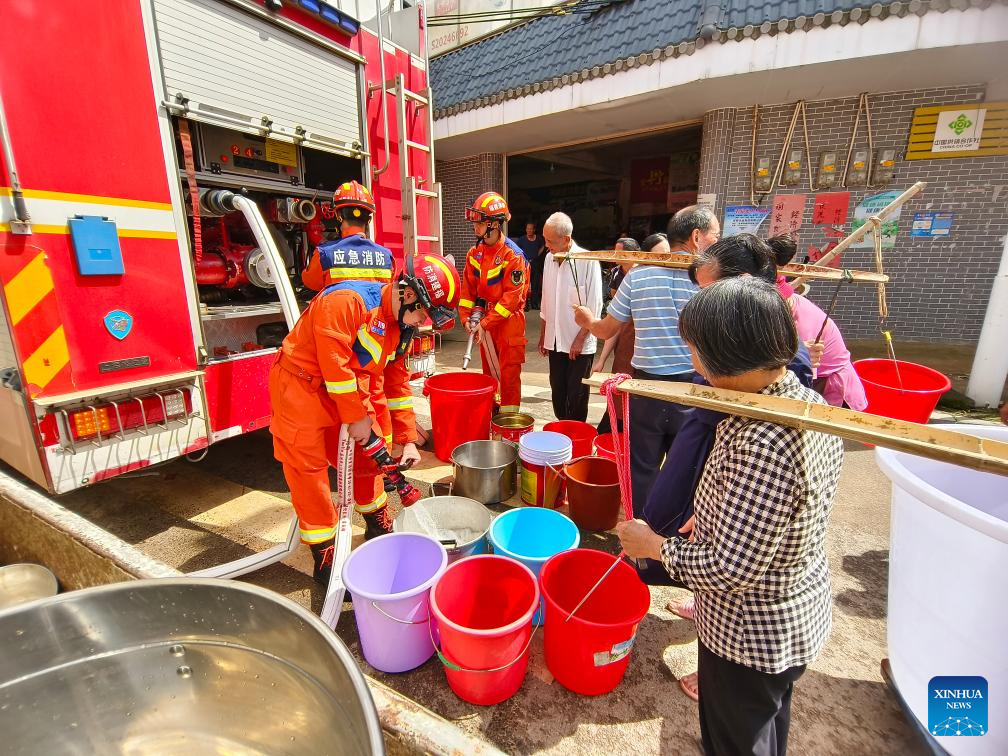 China Focus: China revs up flood rescue efforts as rains continue