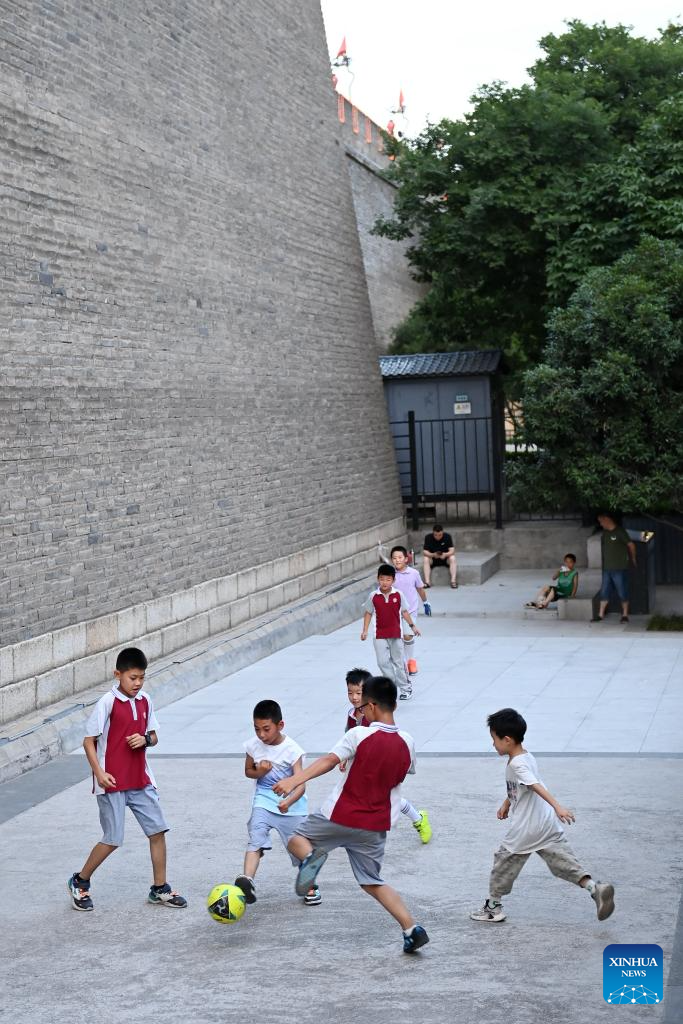 Sports life around the ancient city wall in Xi'an, China