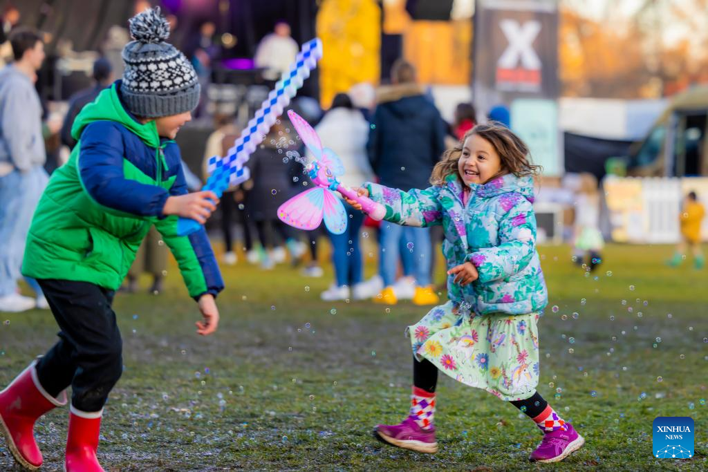 People enjoy themselves during July Christmas event in Canberra, Australia