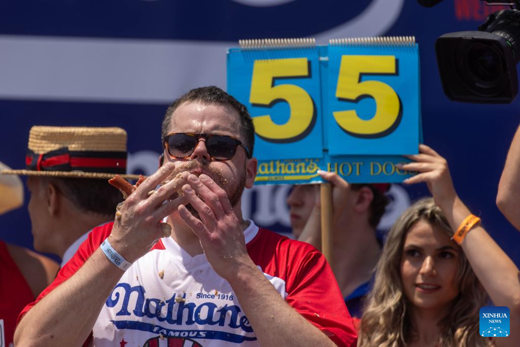 New York hot dog eating contest sees new face of champion