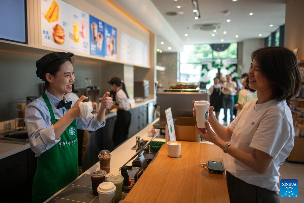 Across China: Cafe provides haven for hearing-impaired in central China