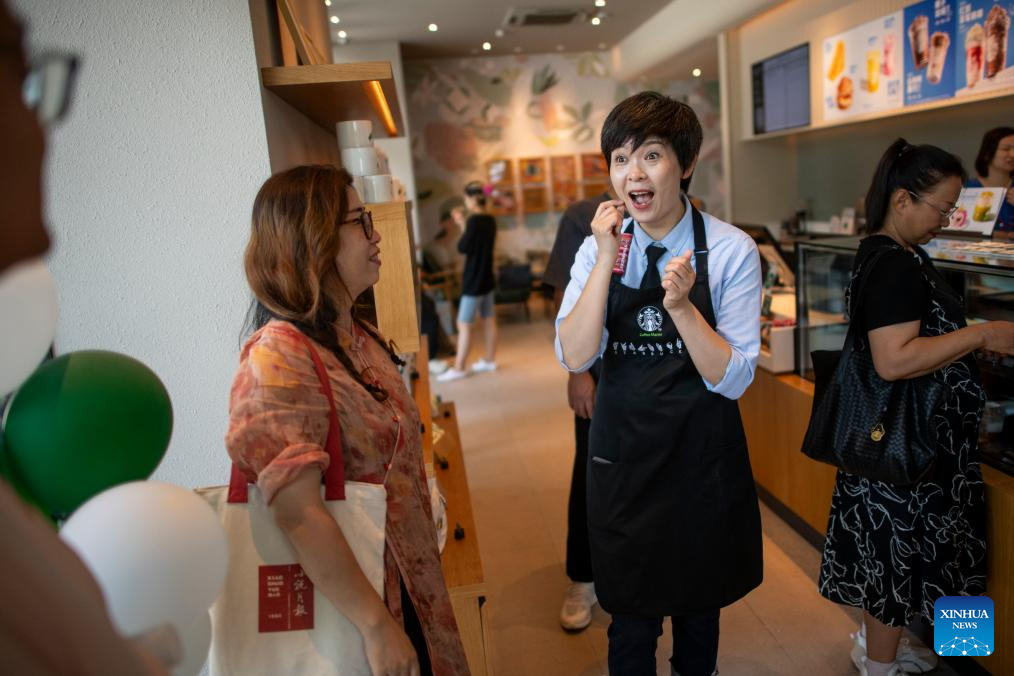 Across China: Cafe provides haven for hearing-impaired in central China