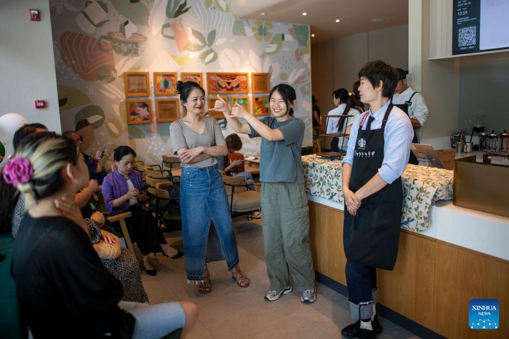 Across China: Cafe provides haven for hearing-impaired in central China