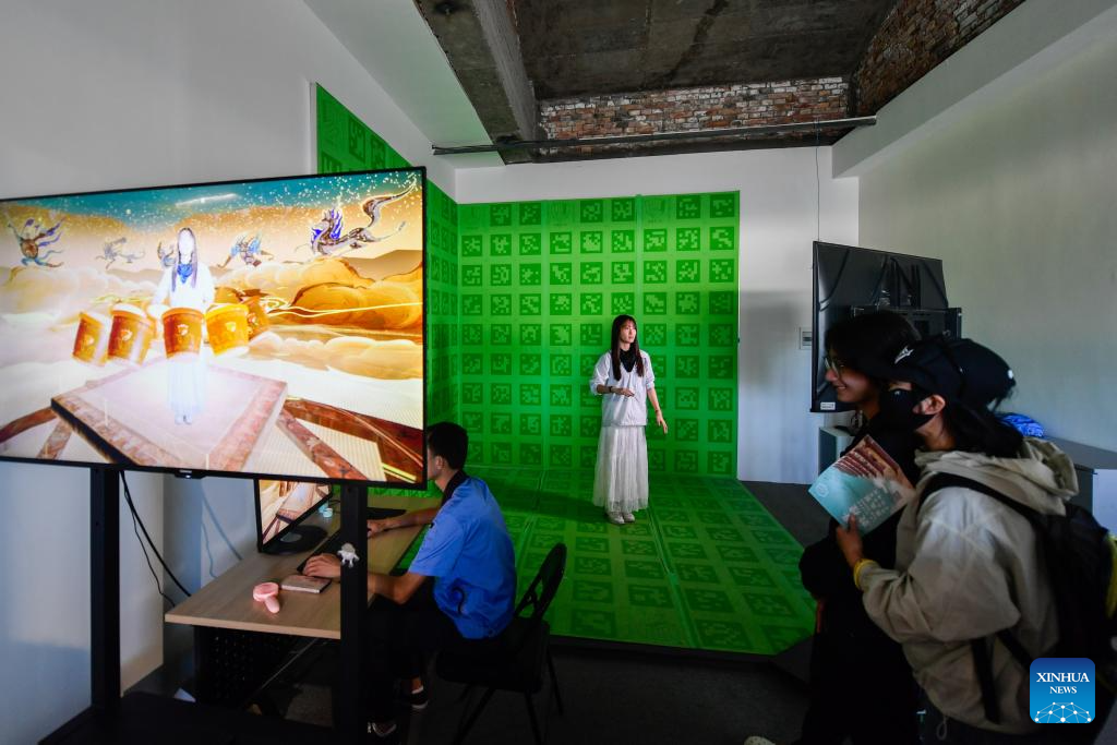 Visitors have immersive impression of Dunhuang culture via digital technology