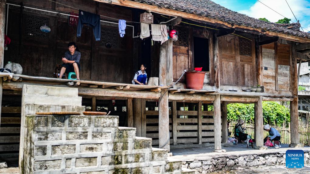 SW China's Tianmen Village features original landscape, traditional folk activities