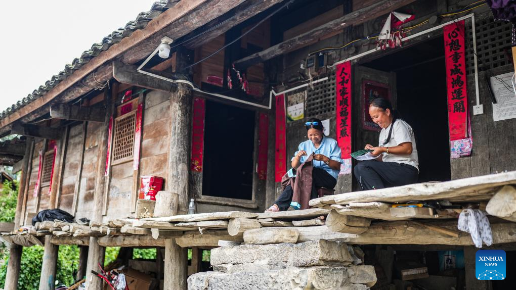 SW China's Tianmen Village features original landscape, traditional folk activities