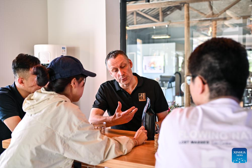 German cafe nestles in picturesque town of east China's Zhejiang