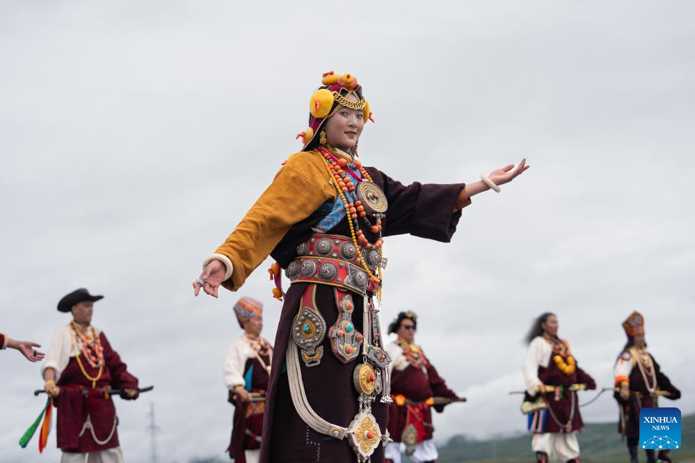 Rural folk event held in Baiyu County, SW China