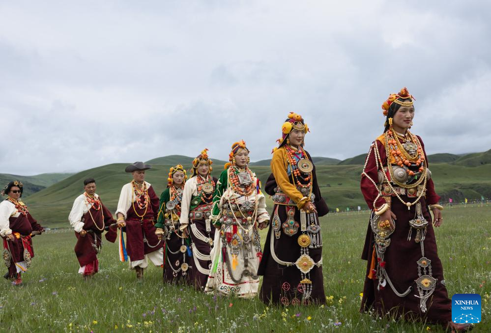 Rural folk event held in Baiyu County, SW China