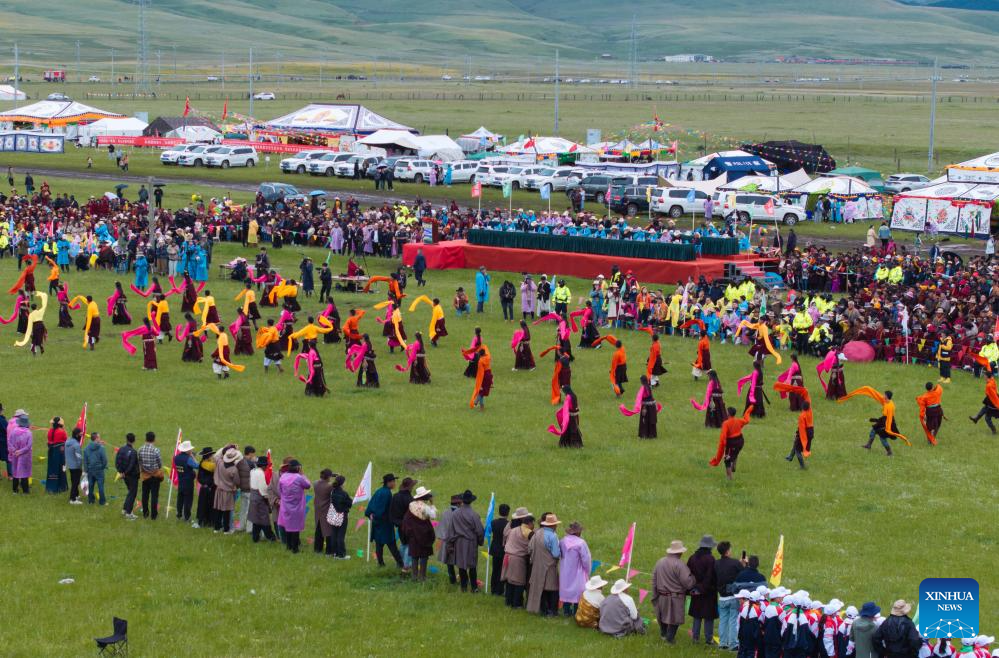 Rural folk event held in Baiyu County, SW China