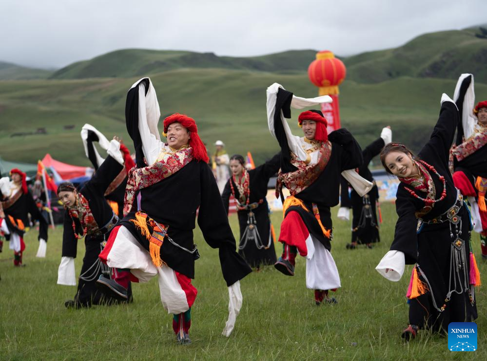 Rural folk event held in Baiyu County, SW China