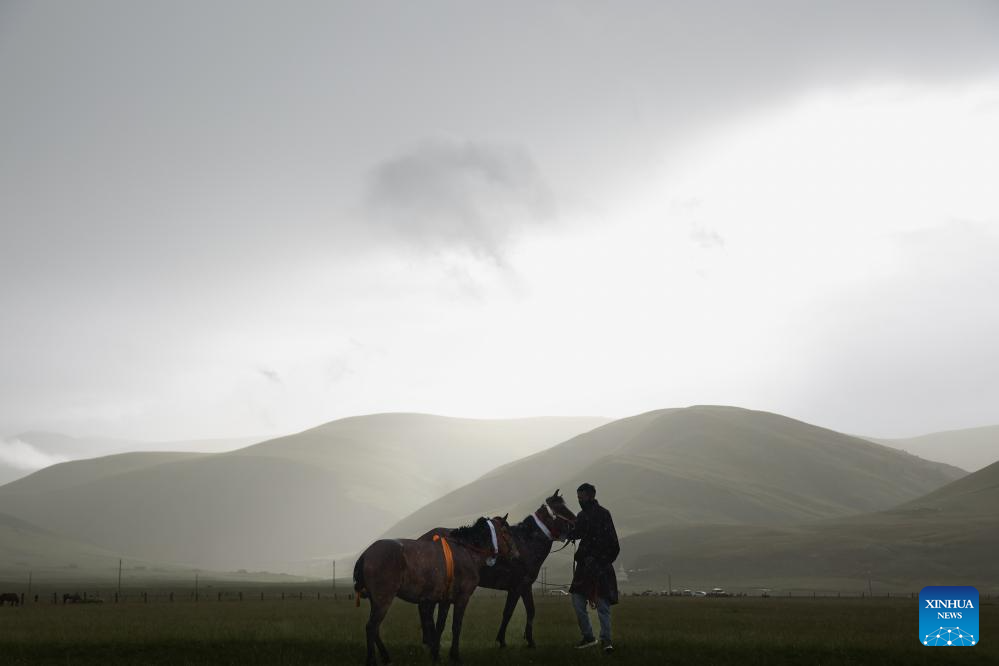 Rural folk event held in Baiyu County, SW China