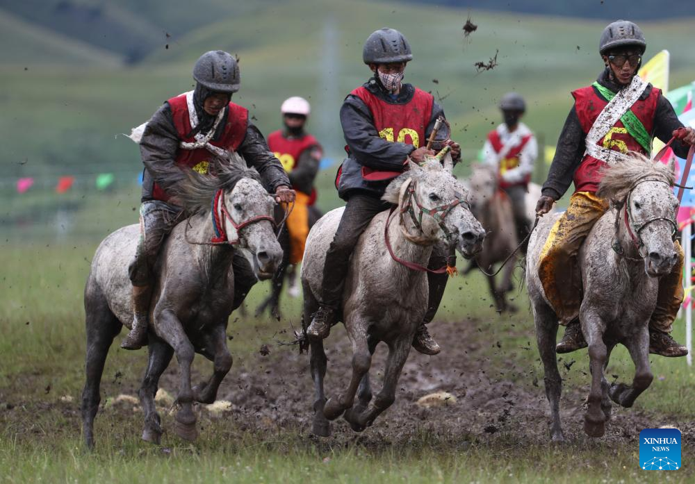 Rural folk event held in Baiyu County, SW China