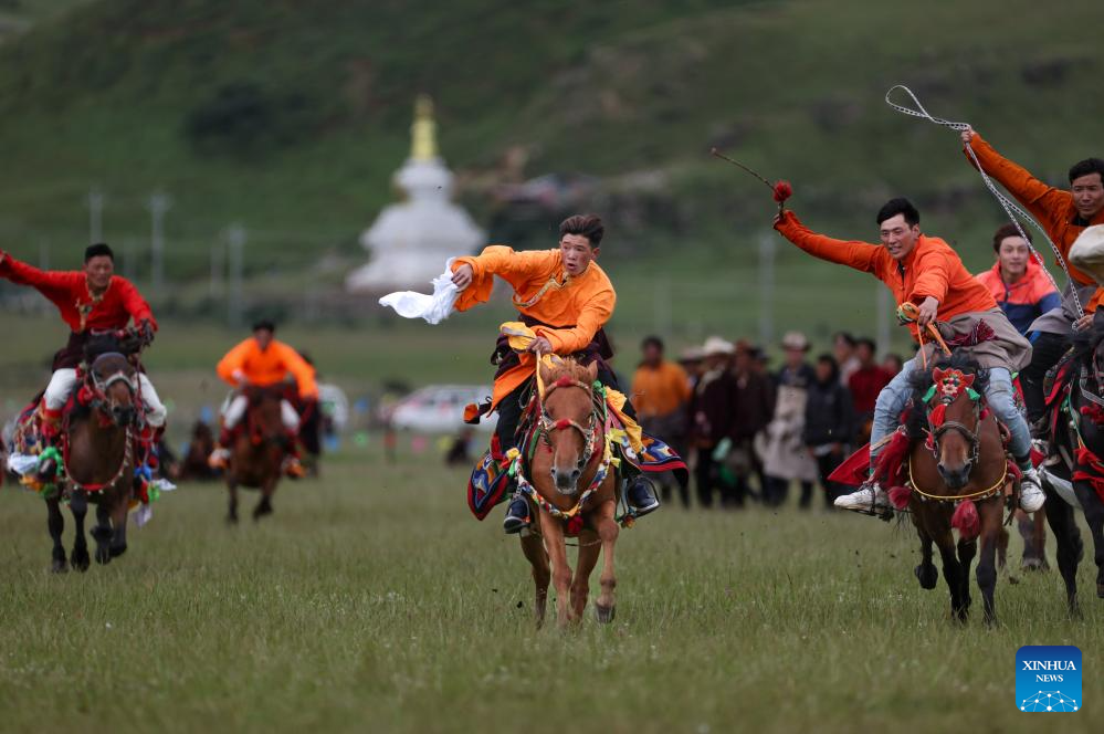 Rural folk event held in Baiyu County, SW China