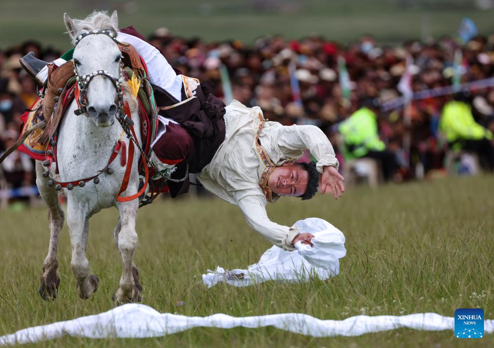 Rural folk event held in Baiyu County, SW China