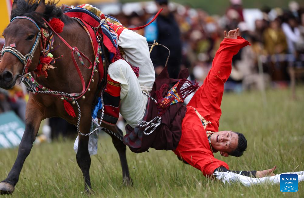 Rural folk event held in Baiyu County, SW China