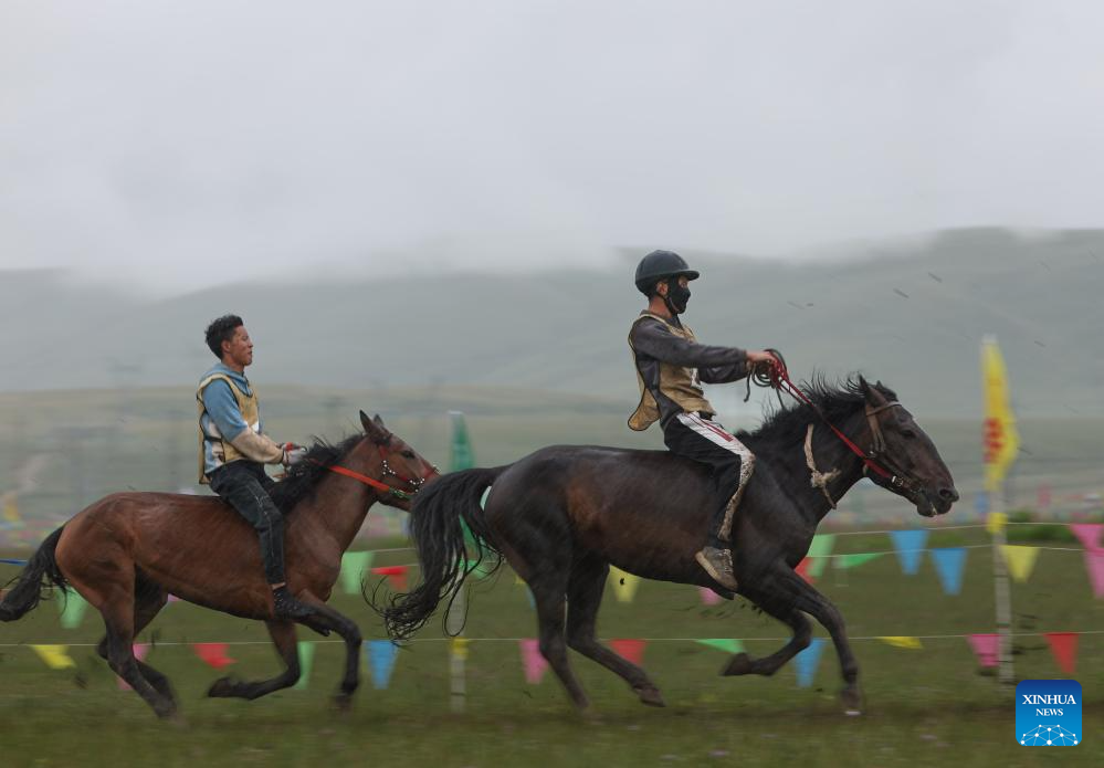 Rural folk event held in Baiyu County, SW China