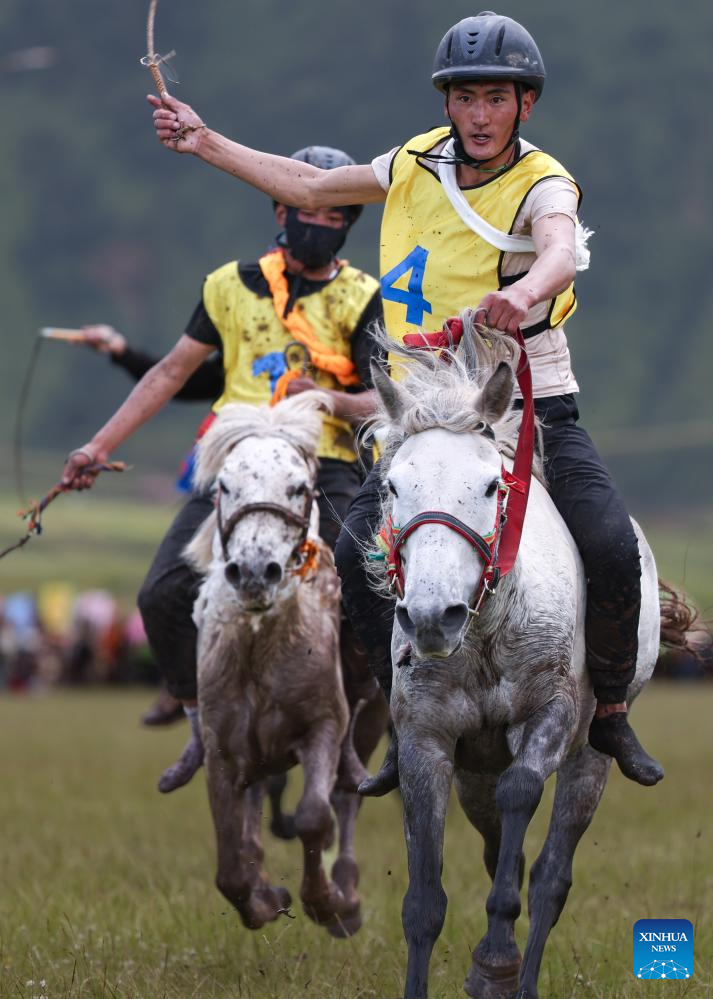 Rural folk event held in Baiyu County, SW China