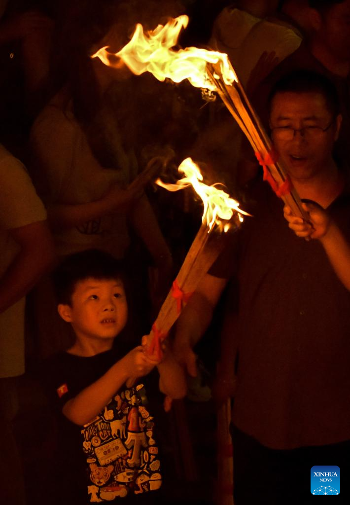 Torch festival celebrated in Chuxiong, SW China